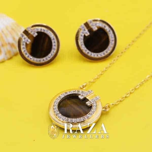 GOLD LOCKET SET WITH TIGER STONE