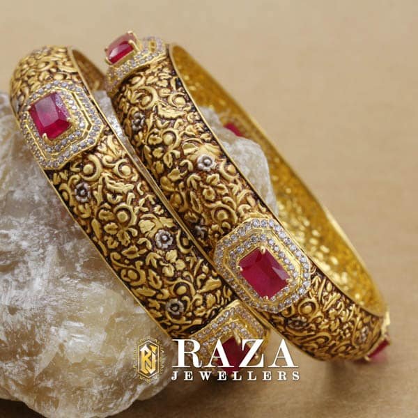 GOLD BANGLES